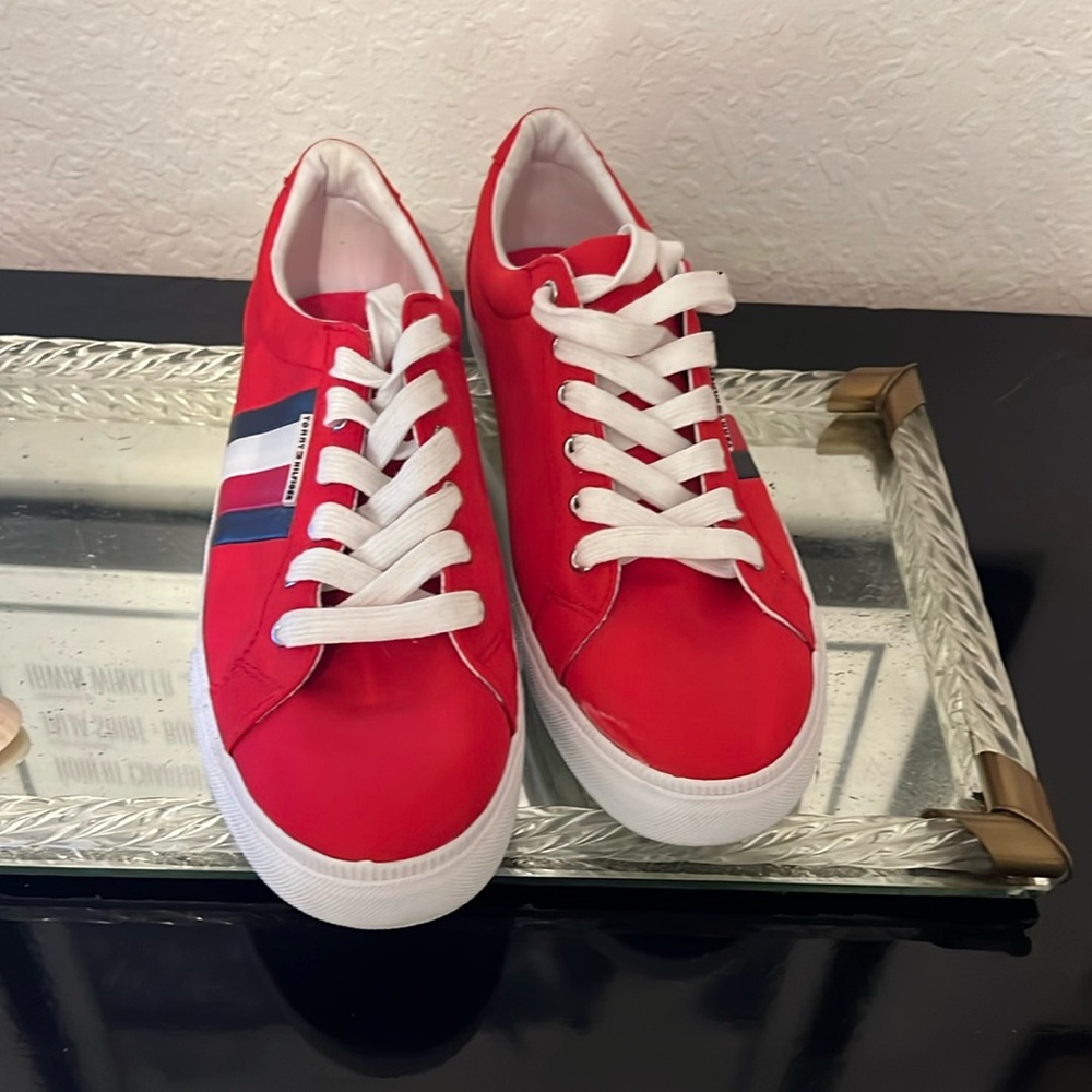Red sneakers, worn once. Excellent condition.